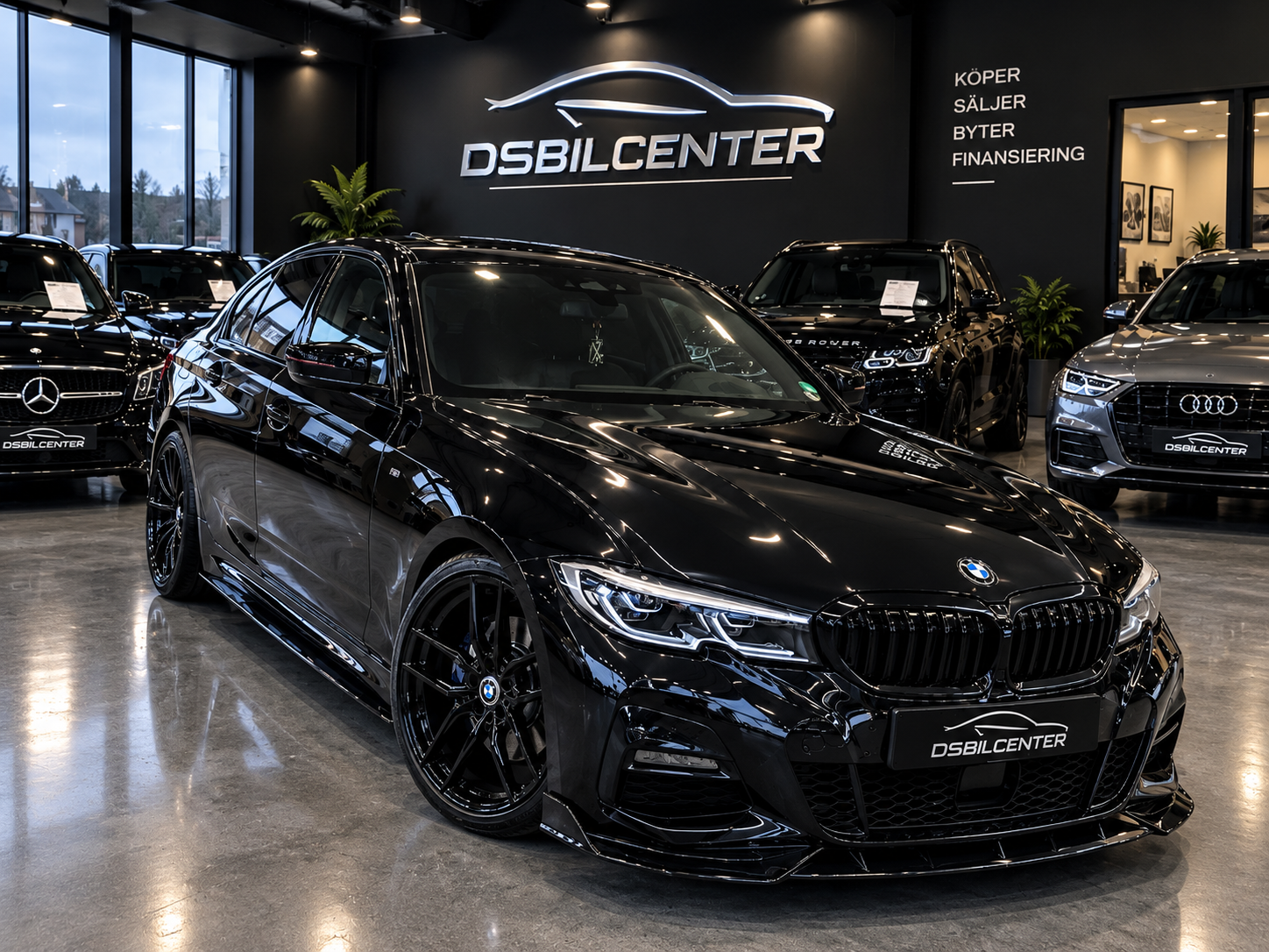 Svart BMW-sedan i DS Bilcenters showroom